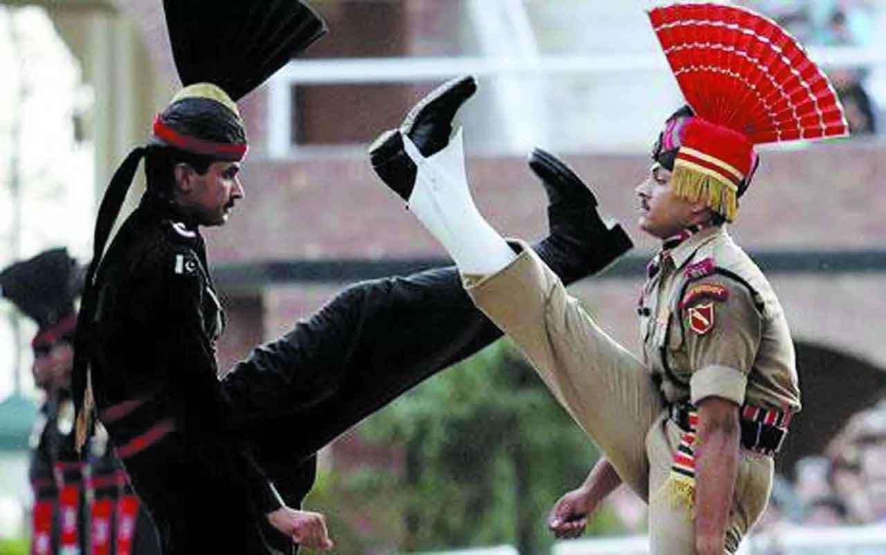 Indian and Pakistani border guards put on a show of one upmanship