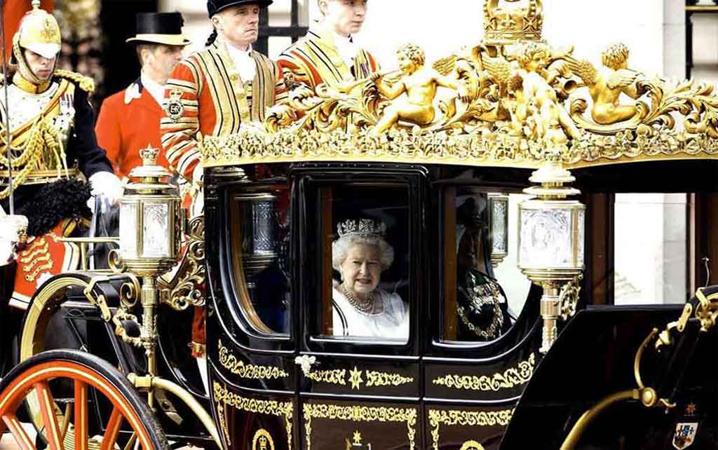 The Queen travelling to the Palace of Westminster by coach